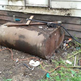 Why should I get rid of my old oil tank?
